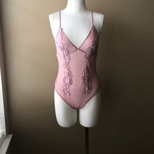 Pink bodysuit